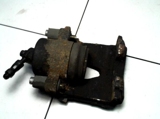 Foto: BREMSSATTEL VORN LINKS eines VW Golf 1.4