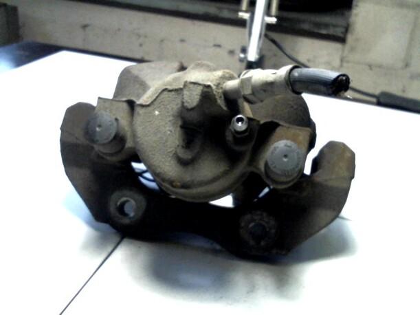 Foto: BREMSSATTEL VORN RECHTS eines Ford Focus Turnier 1.6 TDCi DPF