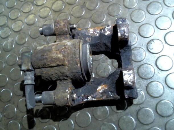 Foto: BREMSSATTEL HINTEN LINKS eines Chrysler Voyager 2.4