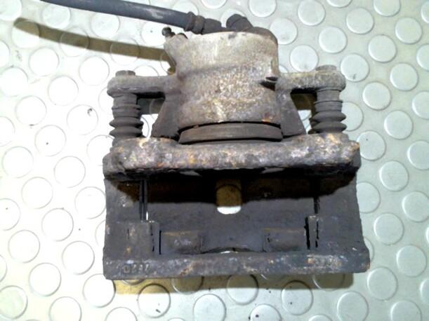 Foto: BREMSSATTEL VORN LINKS eines Nissan Micra 1.2