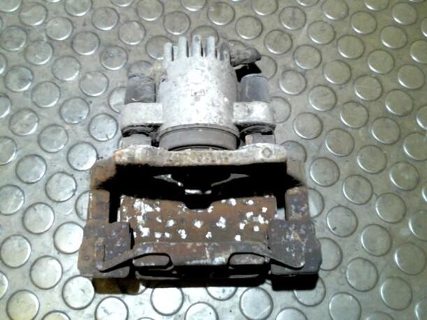 Foto: BREMSSATTEL HINTEN LINKS eines BMW 520i touring Club