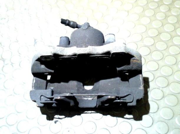 Foto: BREMSSATTEL VORN LINKS eines Opel Astra 1.8 Club