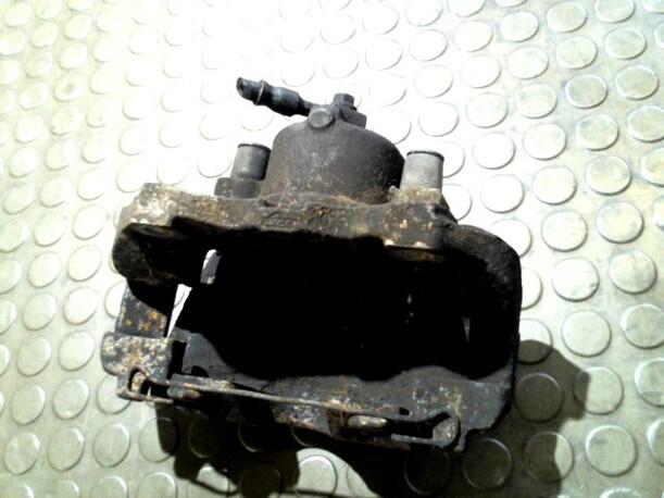 Foto: BREMSSATTEL VORN LINKS eines Opel Astra 2.2 16V Coupe