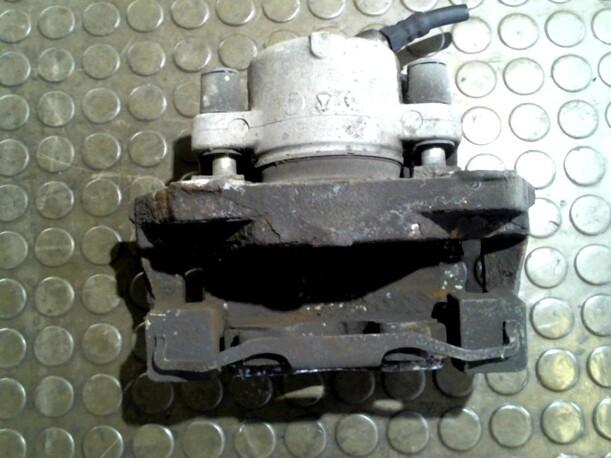 Foto: BREMSSATTEL VORN LINKS eines BMW 520i touring
