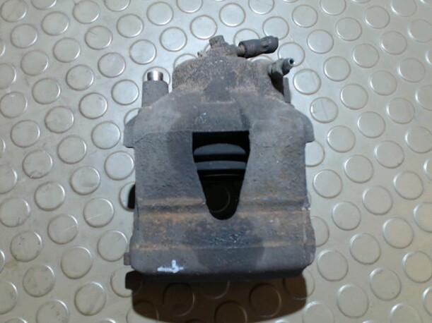 Foto: BREMSSATTEL VORN LINKS eines VW Polo 1.4