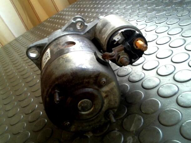 Foto: ANLASSER / STARTER eines Mazda Demio 1.4