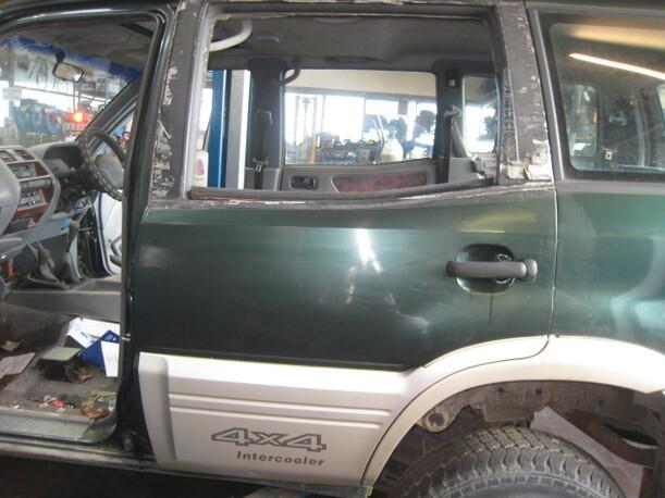 Foto: TÜR HINTEN LINKS eines Nissan Terrano II 2.7 TDi Sunnyboy