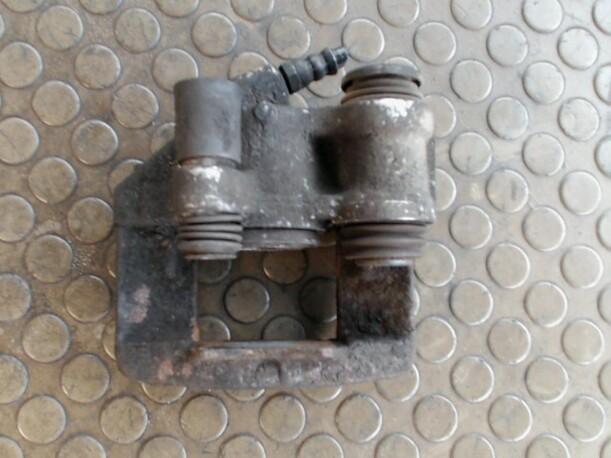 Foto: BREMSSATTEL VORNE RECHTS eines Citroen AX Sunnyboy