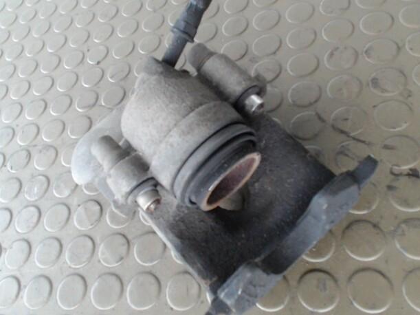 Foto: BREMSSATTEL VORN RECHTS eines VW Golf 1.8 Sunnyboy