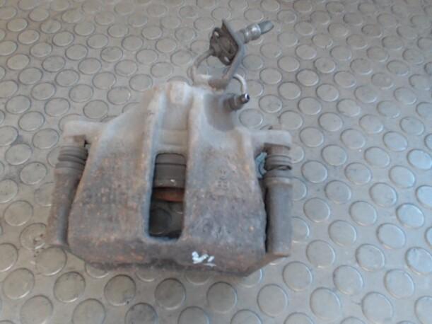 Foto: BREMSSATTEL VORN LINKS eines VW Passat Variant 1.8 GL