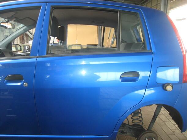 Foto: TÜR HINTEN LINKS eines Daihatsu Cuore 1.0 GL