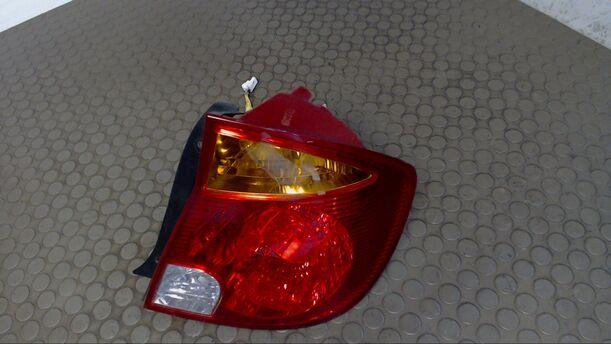Foto: HECKLEUCHTE / RÜCKLEUCHTE RECHTS BESCHÄDIGT eines Hyundai Accent 1.3i SLX