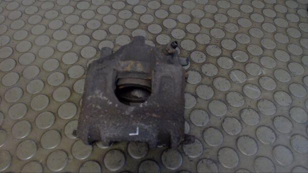 Foto: BREMSSATTEL VORN LINKS eines VW Polo GLX