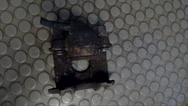 Foto: BREMSSATTEL VORN LINKS eines VW Polo GLX