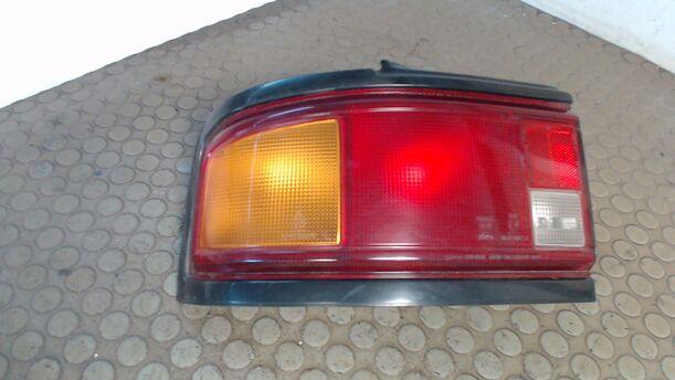 Foto: HECKLEUCHTE / RÜCKLEUCHTE LINKS eines Mazda 323 1.6i GLX