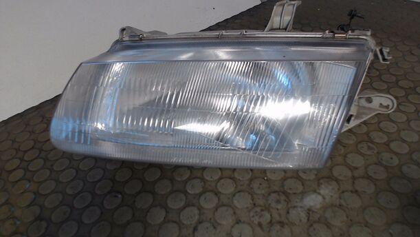 Foto: SCHEINWERFER LINKS eines Mazda 323 S 1.5