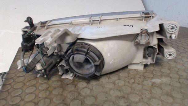 Foto: SCHEINWERFER LINKS eines Mazda 323 S 1.5