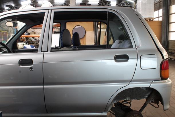 Foto: TÜR HINTEN LINKS eines Daihatsu Cuore