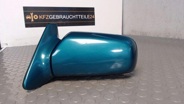 Foto: AUSSENSPIEGEL MECHANISCH LINKS eines Mazda 121 16V Canvas Top Jeans