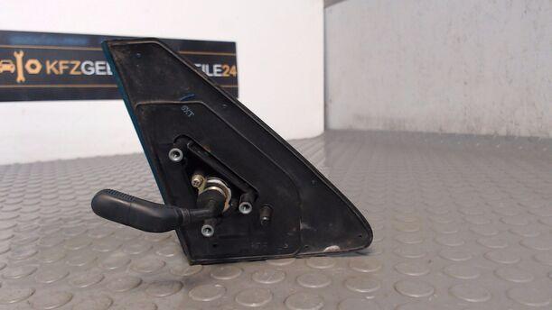 Foto: AUSSENSPIEGEL MECHANISCH LINKS eines Mazda 121 16V Canvas Top Jeans
