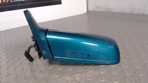 Foto: AUSSENSPIEGEL MECHANISCH LINKS eines Mazda 121 16V Canvas Top Jeans