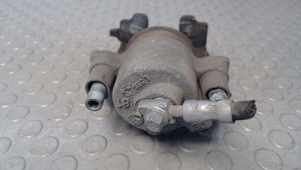 Foto: BREMSSATTEL VORN LINKS eines VW Golf 1.6 FSI Automatik