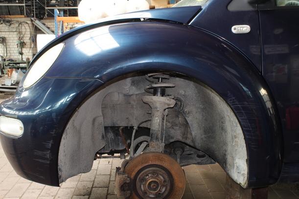 Foto: KOTFLÜGEL VORN LINKS eines VW New Beetle 1.9 TDI
