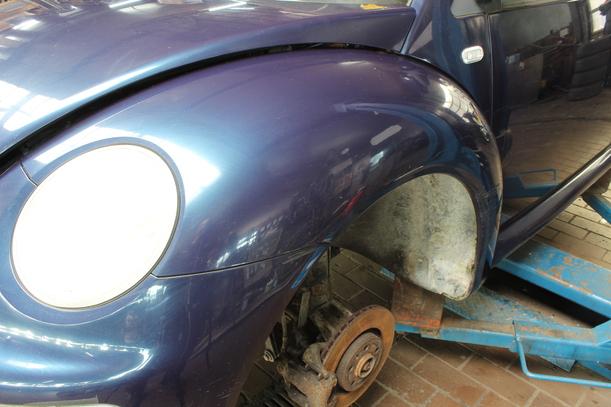 Foto: KOTFLÜGEL VORN LINKS eines VW New Beetle 1.9 TDI