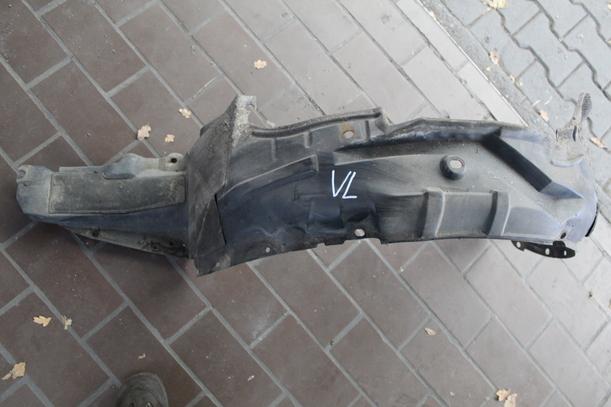 Foto: RADHAUSSCHALE/ INNENRADHAUS VORN LINKS eines Mazda 626 2.0 TD