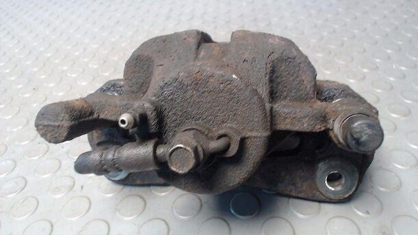 Foto: BREMSSATTEL VORN LINKS eines Mazda 626 2.0 TD CLX
