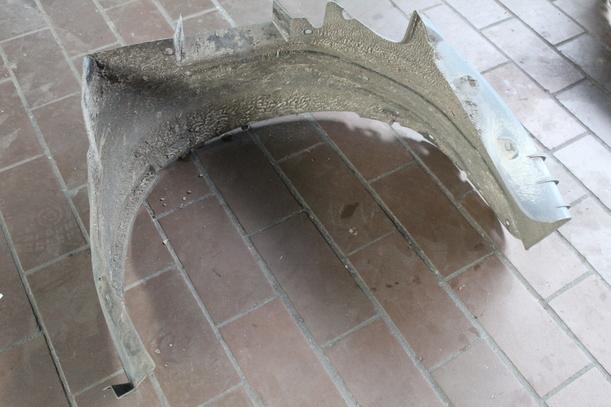 Foto: RADHAUSSCHALE/ INNENRADHAUS VORN LINKS eines Opel Astra 255 592/Z24