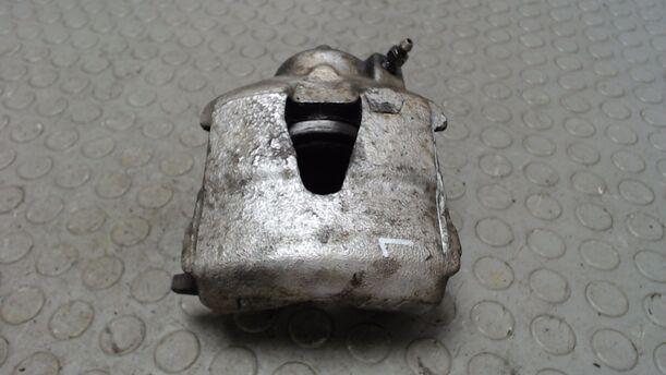 Foto: BREMSSATTEL VORN LINKS eines VW Polo 1.4 SX