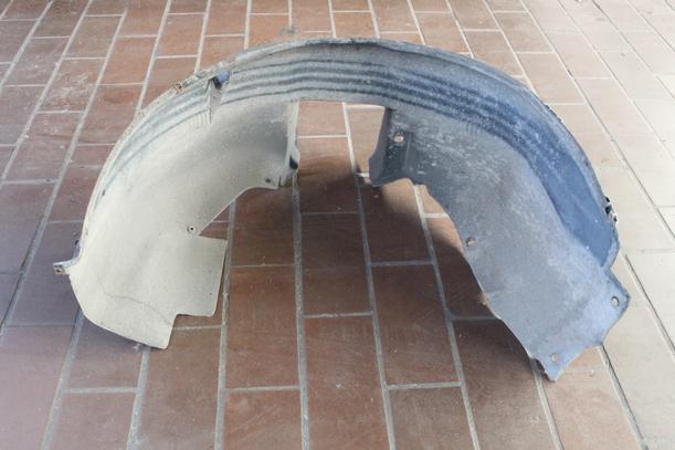 Foto: RADHAUSSCHALE VORN LINKS eines Opel Corsa