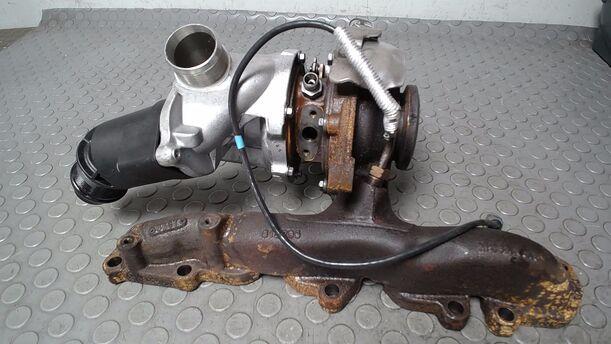 Foto: TURBOLADER MIT AUSPUFFKRÜMMER eines Skoda Octavia Combi 1.6 TDI GL