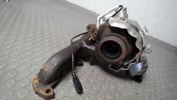 Foto: TURBOLADER MIT AUSPUFFKRÜMMER eines Skoda Octavia Combi 1.6 TDI GL