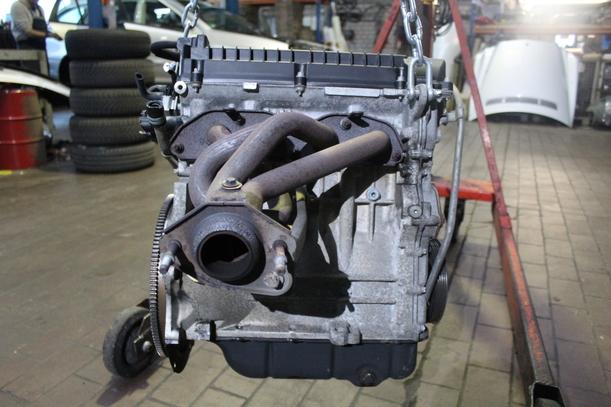 Foto: MOTOR ( 4A90 ) eines Mitsubishi Colt 1.3 GTI