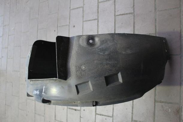 Foto: RADHAUSSCHALE/ INNENRADHAUS VORN LINKS eines Opel Corsa 1.0 12V Highline