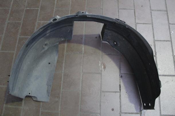 Foto: RADHAUSSCHALE/ INNENRADHAUS VORN LINKS eines Opel Corsa 1.0 12V Highline