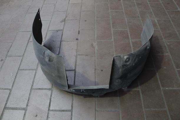 Foto: RADHAUSSCHALE/ INNENRADHAUS VORN RECHTS eines Opel Corsa 1.0 12V Highline