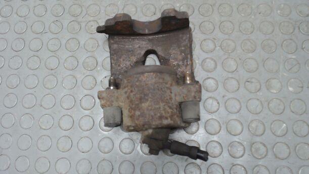 Foto: BREMSSATTEL VORN LINKS eines VW New Beetle 2.0 LS