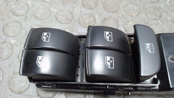 Foto: FENSTERHEBERSCHALTER VORN LINKS eines Saab 9-3 1.9 TiD Sport Kombi DPF GL