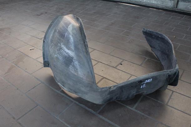 Foto: RADHAUSSCHALE/ INNENRADHAUS VORN LINKS eines Audi 100 acenta