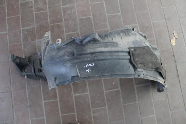 Foto: RADHAUSSCHALE / INNENKOTFLÜGEL VORN RECHTS eines Nissan Primera Traveller 1.8