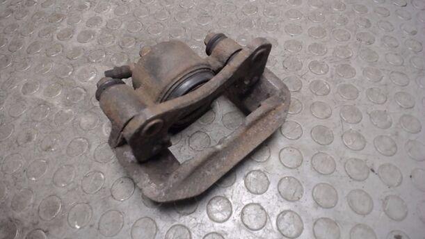 Foto: BREMSSATTELL VORN LINKS eines Daihatsu Cuore 1.0