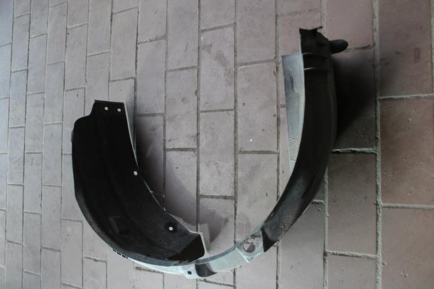 Foto: RADHAUSSCHALE/ INNENRADHAUS VORN LINKS eines Opel Corsa 1.0 12V GL