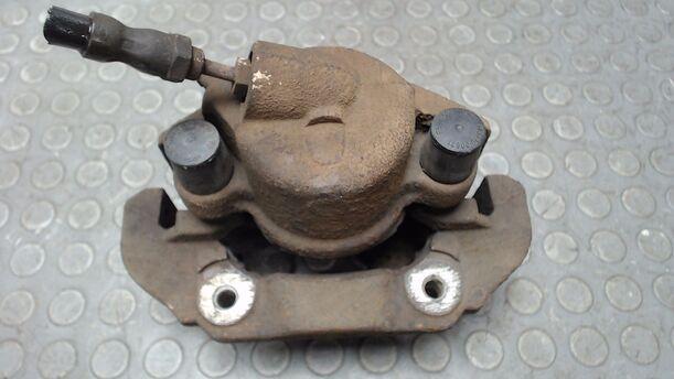 Foto: BREMSSATTEL VORN LINKS eines Ford Fiesta 1.4 GL
