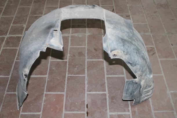 Foto: INNENKOTFLÜGEL / RADHAUSSCHALE LINKS eines Opel Corsa 16V