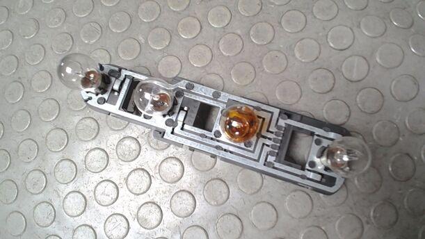 Foto: LAMPENTRÄGER HINTEN LINKS ( FACELIFT ) eines Mercedes-Benz A 140