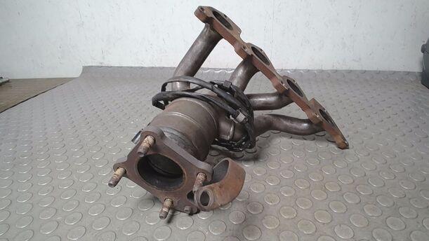 Foto: AUSPUFFKRÜMMER MIT KATALYSATOR eines VW Golf 1.4 Aktion