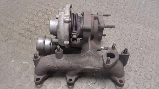 Foto: AUSPUFFKRÜMMER / TURBOLADER eines VW Polo 1.4 TDI L